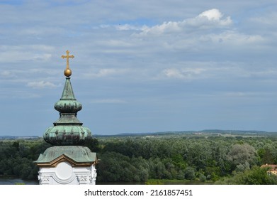 Tanners Cross - Church Spire With Blue Skies And Clouds And Nature