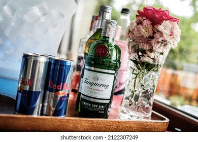 Tanqueray Bottle Near The RedBull. London Dry Gin With Energy Drink