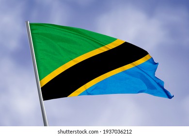 Tanzania flag isolated on sky background. close up waving flag of Tanzania. flag symbols of Tanzania.