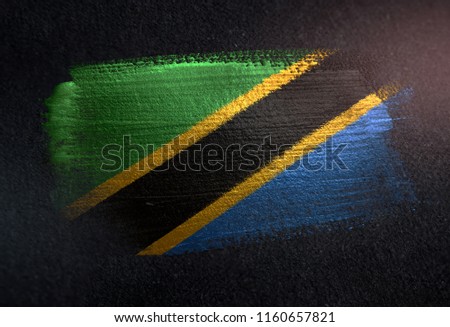 Tanzania Flag Made of Metallic Brush Paint on Grunge Dark Wall