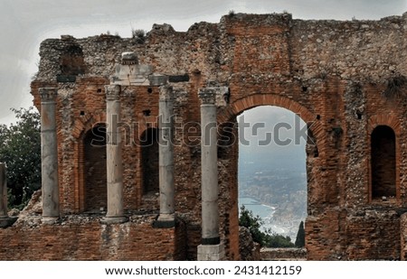 Taormina, Sicily, Italia. The city is famous for the Ancient Theater of Taormina, an ancient Greco-Roman theater still in use today.