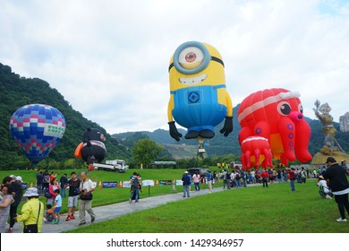 Taoyuan Daxi, Taiwan, Jun. 15, 2019: The USA Minions met the Japan octopus (Tako). Two popular balloons unveil the event.