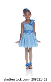 Tap Dancer.  Adorable Little Girl Dressed In A Dance Outfit And Tap Shoes Performing A Routine.  Isolated On White.