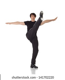 Tap Dancer In Blue Jeans And Tap Shoes Doing Steps On A White Background And Floor