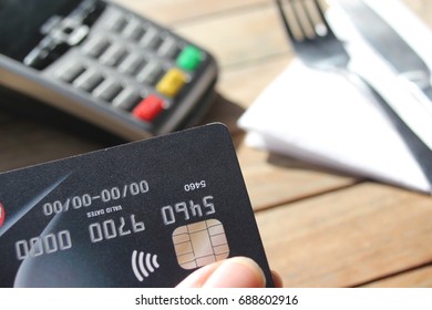 Tap Pay Credit Card Coronavirus Covid 19 Ban Concept -contactless Payment Card Pdq Background Copy Space With Hand Holding Credit Card To Pay At Cafe Restaurant Coffee Shop Smartcard Stock Photograph