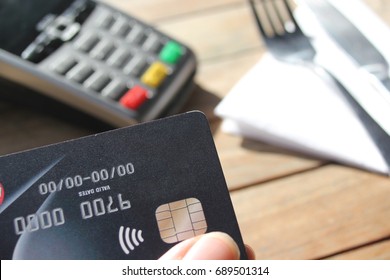 Tap Pay Credit Card Coronavirus Covid 19 Ban Concept -contactless Payment Card Pdq Background Copy Space With Hand Holding Credit Card To Pay At Cafe Restaurant Coffee Shop Smartcard Stock Photograph