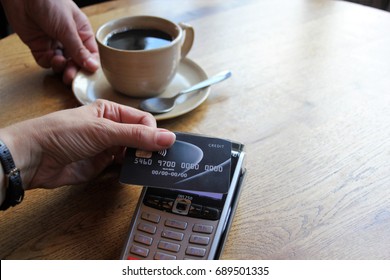 Tap Pay Credit Card Coronavirus Covid 19 Ban Concept -contactless Payment Card Pdq Background Copy Space With Hand Holding Credit Card To Pay At Cafe Restaurant Coffee Shop Smartcard Stock Photograph