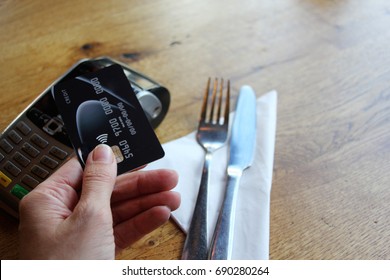 Tap Pay Credit Card Coronavirus Covid 19 Ban Concept -contactless Payment Card Pdq Background Copy Space With Hand Holding Credit Card To Pay At Cafe Restaurant Coffee Shop Smartcard Stock Photograph