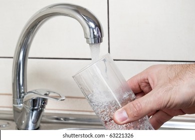 Tap Water And A Glass Of Water