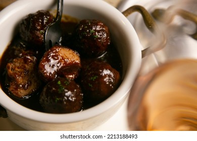 Tapa Of Beef Meatballs With Red Wine Sauce.