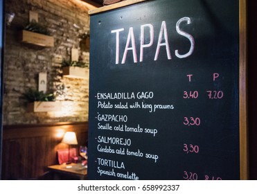 Tapas bar in Spain. Spanish tapas bar in historical center of Seville at night