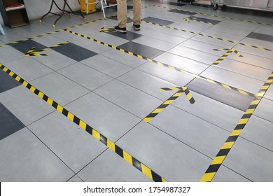 Tape On The Floor In Local Food Stall For Customers To Practice Social Distance To Reduce Risk Of Further Transmission During Coronavirus Crisis, Safety Measures.