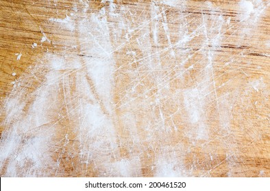 Tapioca flour on chopping block as background