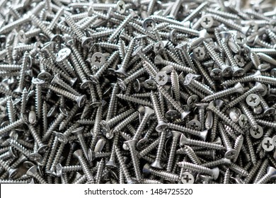 tapping screws made od steel, metal screw, iron screw, chrome screw, screws as a background, wood screw, 