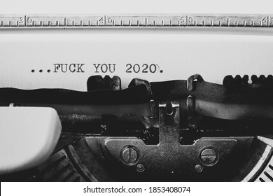 Taranto, Italy - November 13, 2020: End Of Year, Goodbye Message To The Year 2020 Written On A White Sheet With A Mechanical Typewriter, Monochrome Black And White Image With Opaque Treatment.