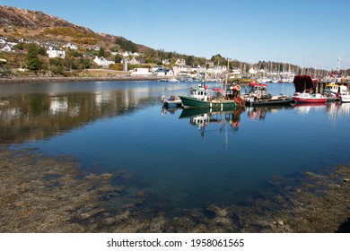 Tarbert, Scotland: April 17 2021: Small Fishing Boats Docked At A Bay Pier In Tarbert, Fishing Trade Impacted By Brexit