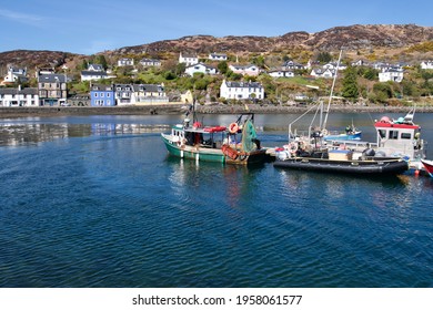 Tarbert, Scotland: April 17 2021: Small Fishing Boats Docked At A Bay Pier In Tarbert, Fishing Trade Impacted By Brexit