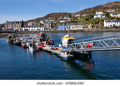 Tarbert, Scotland: April 17 2021: Small Fishing Boats Docked At A Bay Pier In Tarbert, Fishing Trade Impacted By Brexit