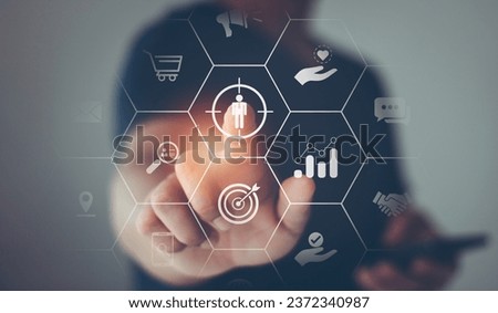 Target audience, buyer persona, customer behavior concept. Personalization marketing, customer centric strategies, Brand research analysis technology. Business people touch target customer on screen.