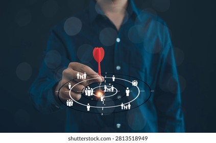 Target audience and customer segmentation concept with a dart hitting the center of a marketing target. Representing audience targeting, consumer insights, market analysis, and business strategy.