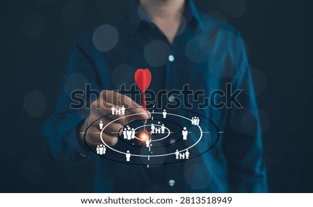 Target audience and customer segmentation concept with a dart hitting the center of a marketing target. Representing audience targeting, consumer insights, market analysis, and business strategy.