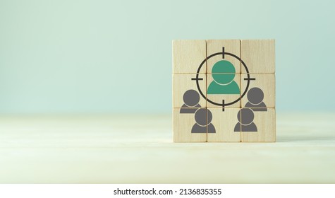 Target customer, buyer persona, marketing segmentation, job recruitment concept. Personalization marketing, customer centric strategies. The wooden cube blocks with focused on target customer symbols.