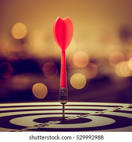 target dart with arrow over blurred bokeh background ,metaphor to target marketing or target arrow concept. - Shutterstock ID 529992988