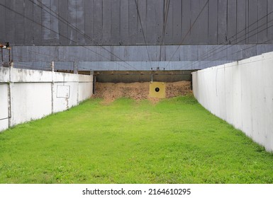 Target Gun With Bullet Holes. Classic Paper Shooting Target at shooting range. Holes In Target. For Sport, Hunters, Military, Police. Sport shooting circle target accuracy bullet hole.