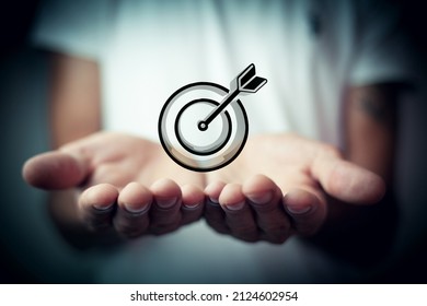 target icon with a dart in the center - Shutterstock ID 2124602954
