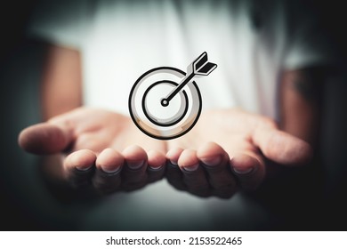 target icon with a dart in the center - Shutterstock ID 2153522465