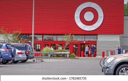 Target Retail Store Customers Wearing Virus Protection Masks Exit After Shopping, Saugus Massachusetts USA, July 18, 2020                             