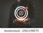 Targeting business concept. Businessman hold virtual target icons for business objective. Strategic planning for business growth and target customer group. set up business objective target goal.