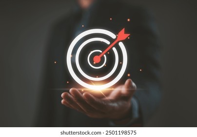 Targeting business concept. Businessman hold virtual target icons for business objective. Strategic planning for business growth and target customer group. set up business objective target goal.