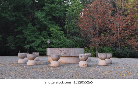 Targu Jiu, Romania, September 23, 2019, The table of Silence, The table of Silence of the famous sculptor Constantin Brancusi, autumn in the park and the table of silence