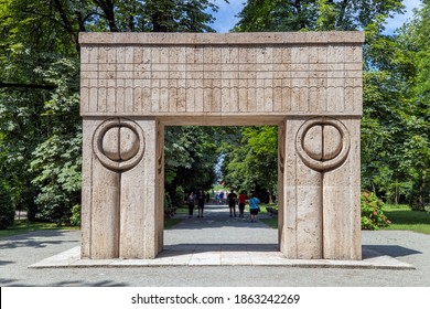 TARGU-JIU, ROMANIA - JULY 23, 2020: Kissing Gate, symbolize the triumph of life over death. The sculpture is part of the Sculptural Ensemble of famous sculptor Constantin Brancusi at Targu Jiu.