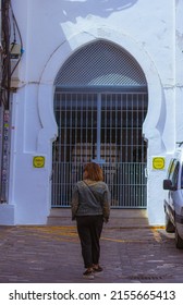 Tarifa, Spain - 4 May 2022 :woman  waking in tarifa old town