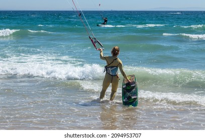 Tarifa, Spain - August 15, 2021: Kite surfing in Tarifa, Spain. Tarifa is most popular places in Spain for kitesurfing