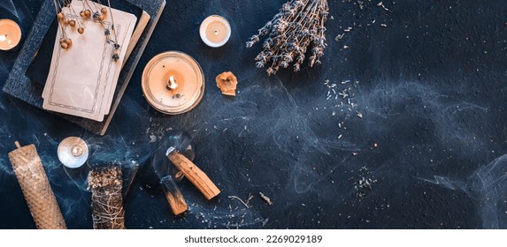 Tarot, astrology,Esoteric, Occult mystical ritual scene of sorcery tarot candles,dried flowers, palo santo tarot cards, ritual book.Witchcraft,mysticism and occultism,esoteric background,tarot banner - Shutterstock ID 2269029189
