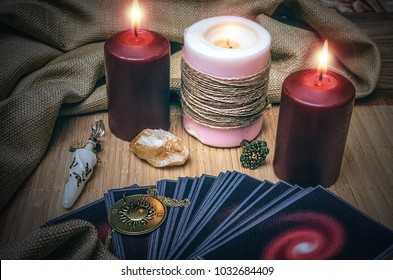 Tarot cards on desk table of fortune teller. Future reading concept. - Shutterstock ID 1032684409