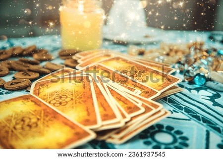 Tarot cards on the table. Selective focus. Magic.