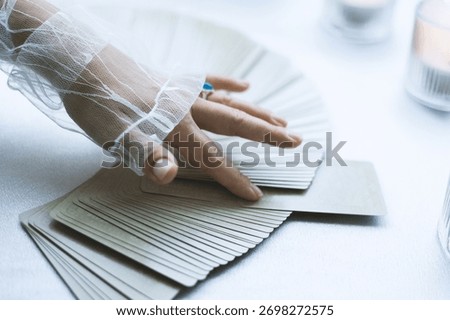 The tarot reader is doing a reading