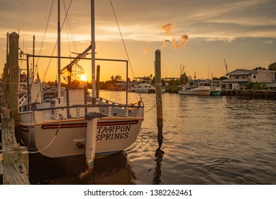 Tarpon Springs, FL 7/28/2018 Sunset Over Boat Docked At Sponge Exchange On Anclote River