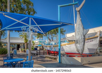 TARPON SPRINGS - JUNE 30, 2019: A Small Historical Waterside Town With A Courtyard And A Great White Shark.