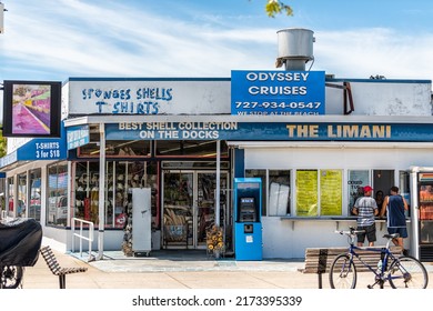 Tarpon Springs, USA - October 4, 2021: Small European Greek Town Street Dodecanese Boulevard Road In Florida And Sign For Odyssey Cruises Tickets