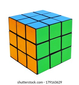 TARRAGONA, SPAIN - FEBRUARY 3, 2014: Rubiks Cube On A White Background. This Famous Cube Puzzle Was Invented By The Architect Erno Rubik In 1974