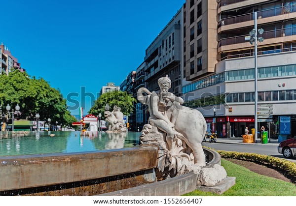 Tarragona,\
Spain-August 9, 2013: the fountain is decorated with sculptures\
depicting the four continents. Fountain of the century. The\
Attractions Of Tarragona,\
Catalonia