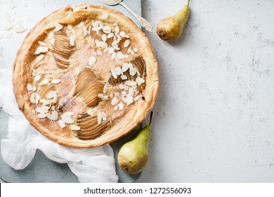 Tart with poached pears and almond frangipane