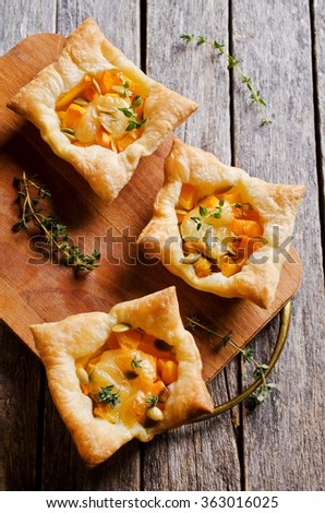 Similar – Puff pastry biscuits with nectarines, camembert and thyme