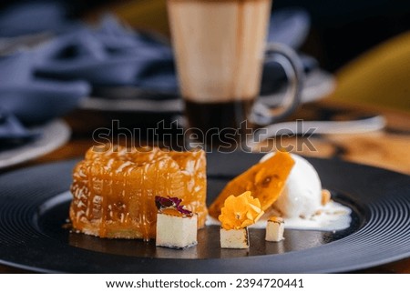 Tarta Tine served in dish isolated on table side view of arabic baked dessert food