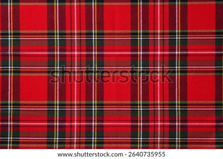 Tartan pattern, checkered, colored, seamless fabric for design or wallpaper background. Close up. Copy space. Top view.